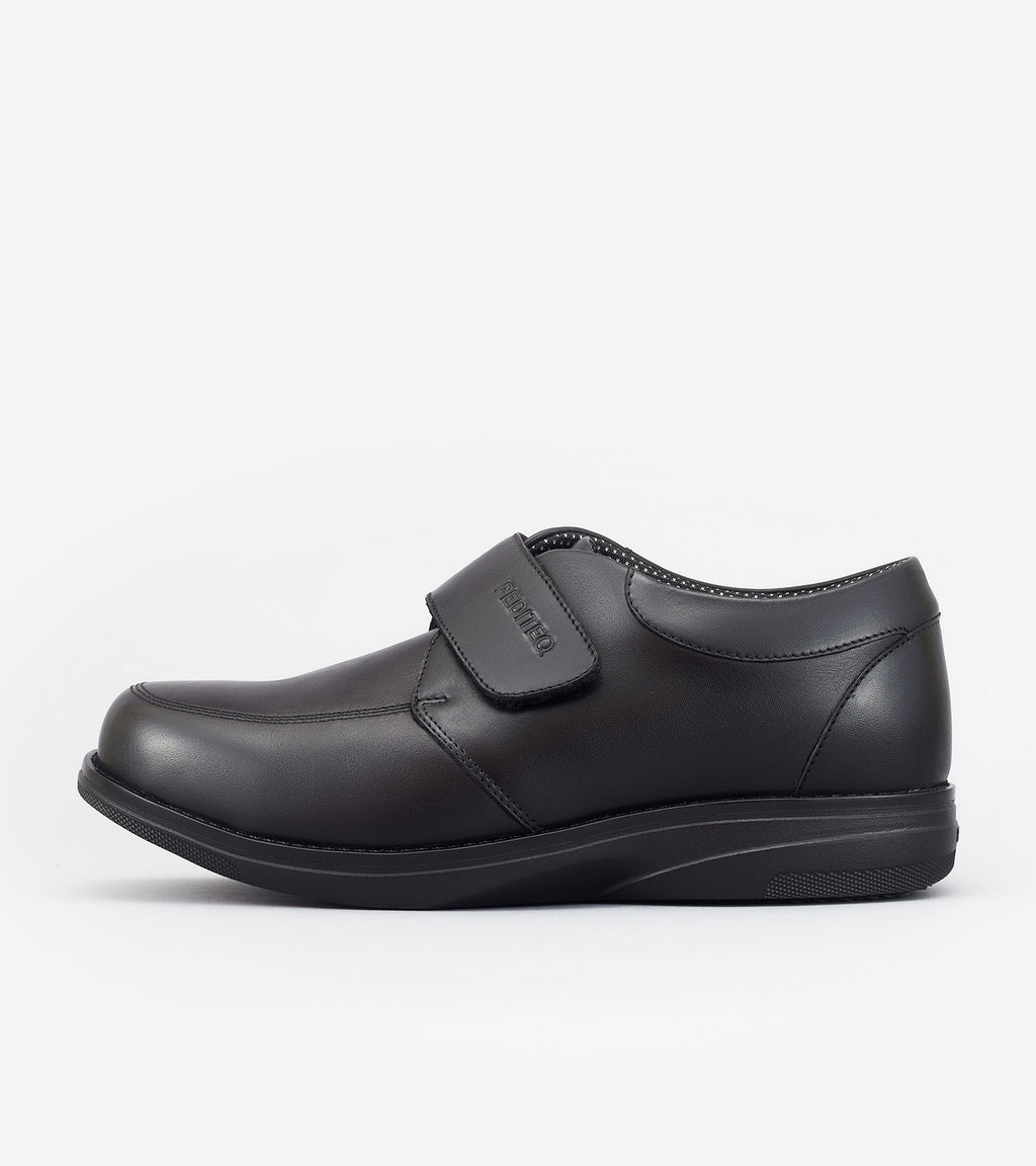Black running shoe on a white background