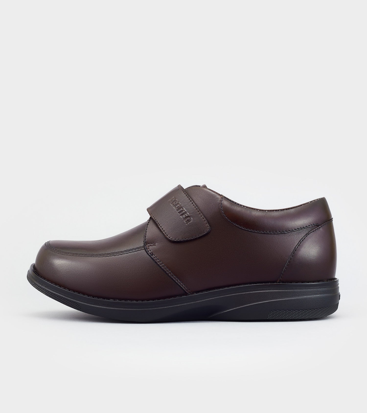 Brown running shoe on a white background