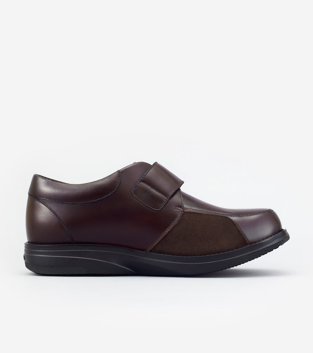 Brown shoe on a white background